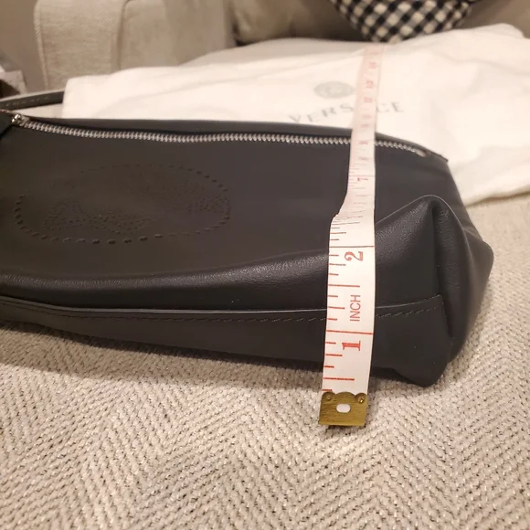 Brand new Versace leather clutch wrislet